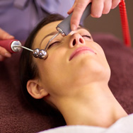 A women Taking facial lymphatic drainage massage