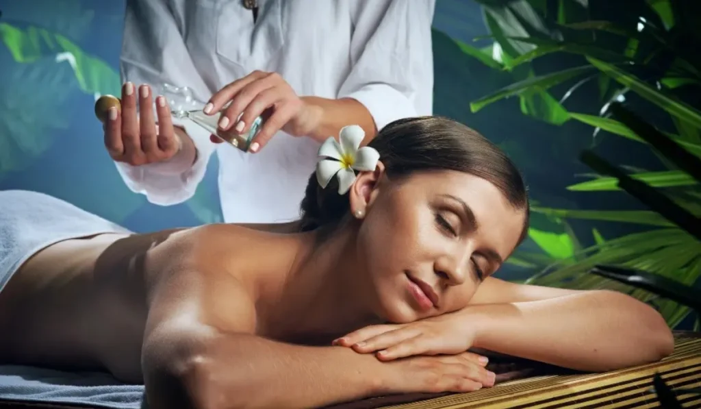 Scalp massage with essential oils to promote relaxation and healthy hair.